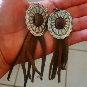 Nice long leather and Concho earrings